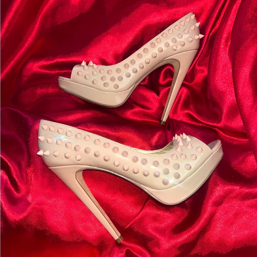 Beautiful, nude patent leather spiked platform pumps. Women’s size 8.5 US.